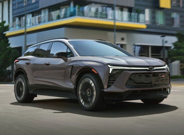 Passenger View of a 2024 Blazer EV driving on a City Street