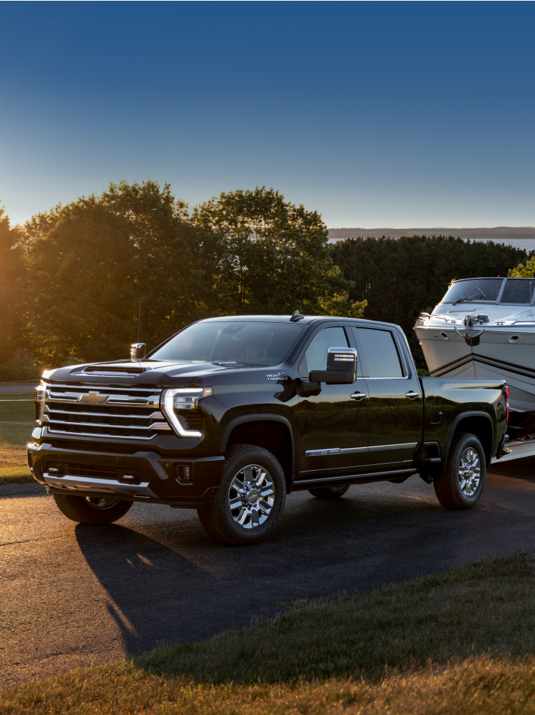 Front Drivers Side 3/4 Shot of Silverado HD Towing Boat