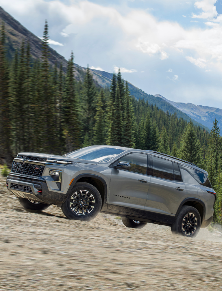 A Side View of a 2025 Chevy Traverse Going Uphill